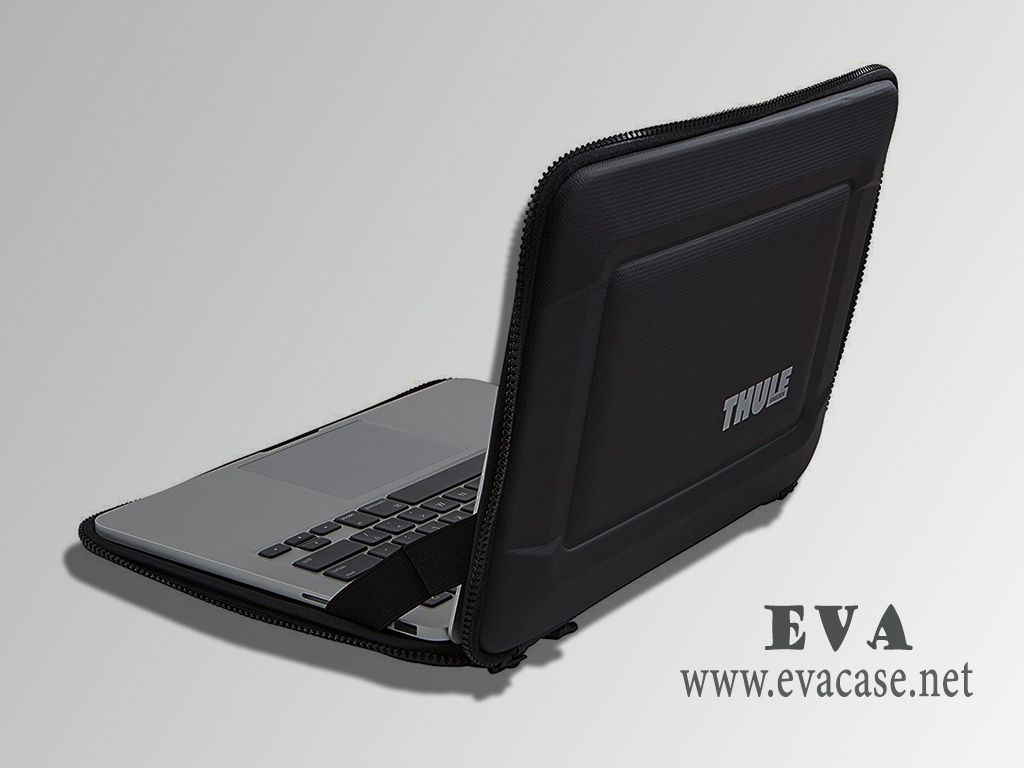 Thule hard shell laptop bag with clamshell design rigid exterior and